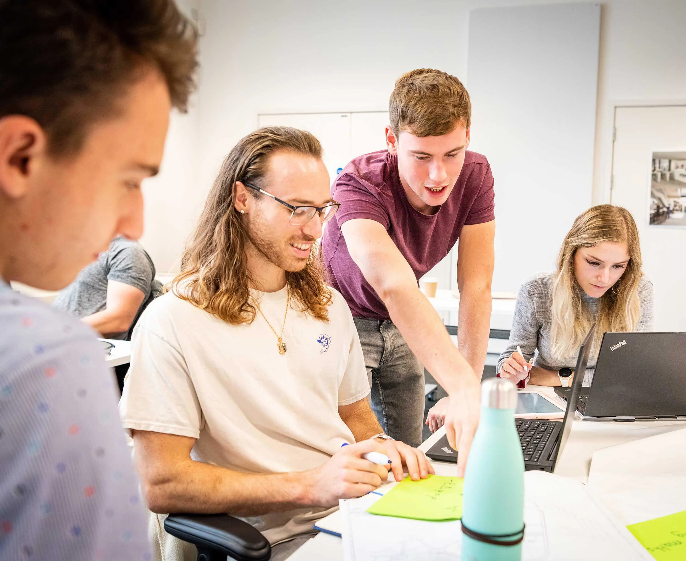 Alex Trenam, Ryan Hughes, Lois Player and Kacper Kaczmarczyk working together.
